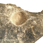 Located at the top of crystal.